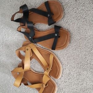 2 pairs Sarta. flat sandals. tan and black. size 8. Scrappy cute